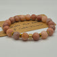 Matte Pink Beaded Bracelet with Gold-Tone Accents