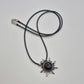Black Sunburst Pendant Necklace with Cord
