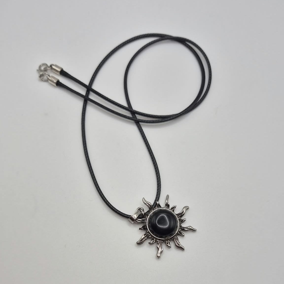 Black Sunburst Pendant Necklace with Cord